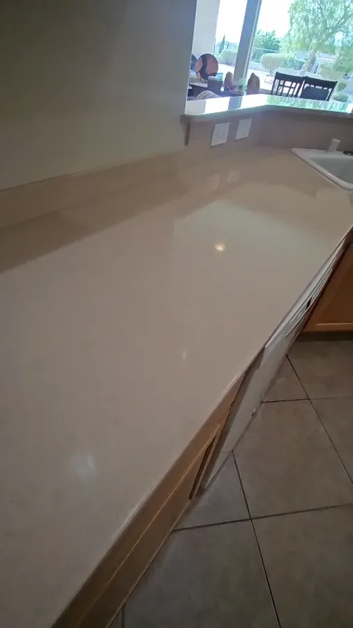 Corian solid-surface countertop with an integrated sink after refinishing