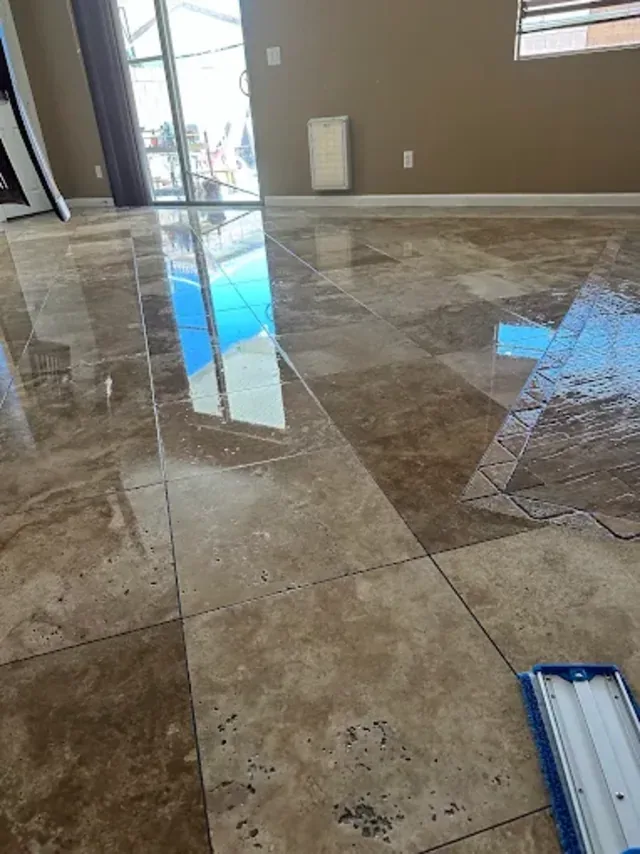 Travertine floor being cleaned, from a similar job