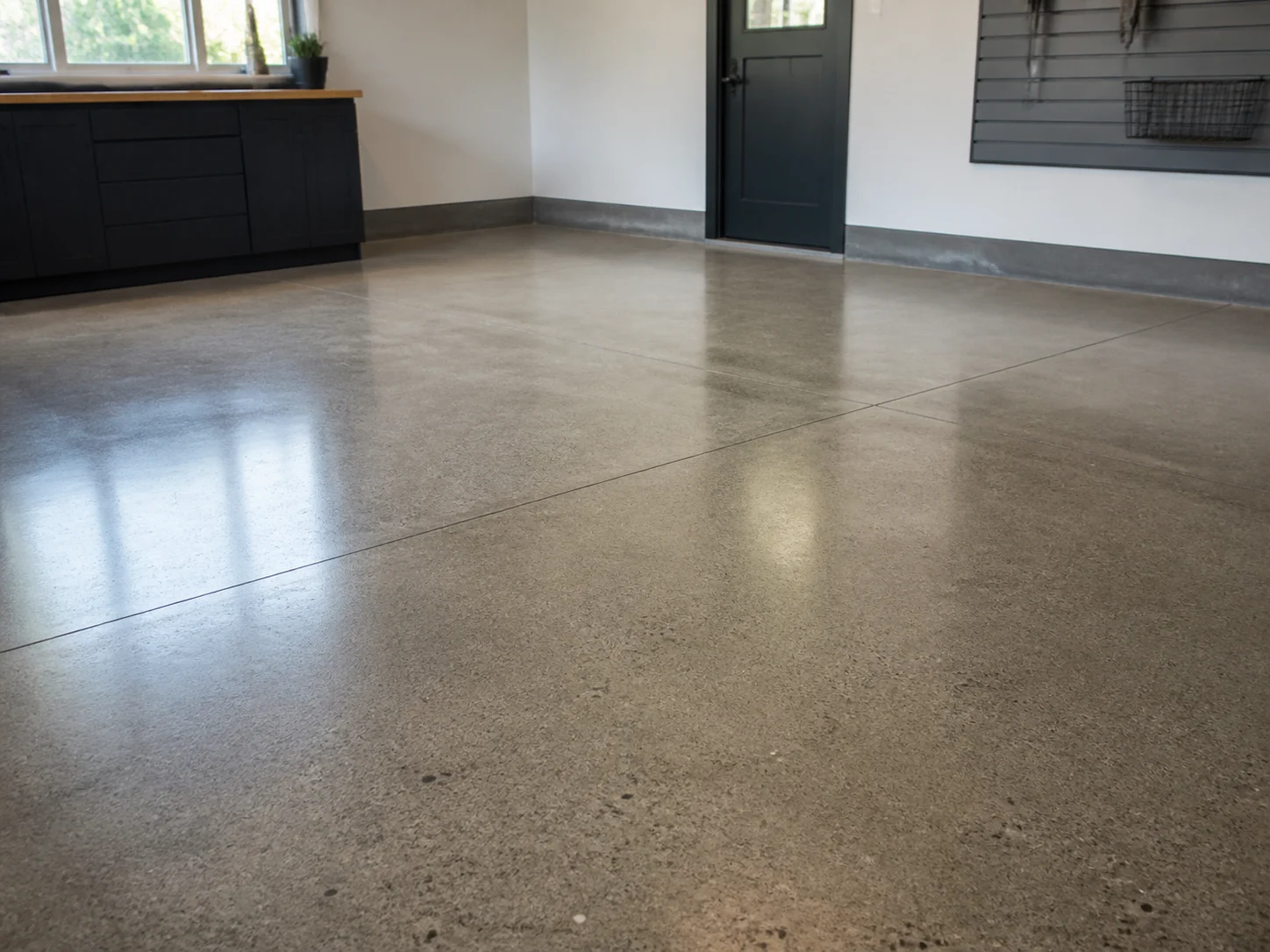 Illustrative view of a smooth interior concrete floor with a restrained satin sheen